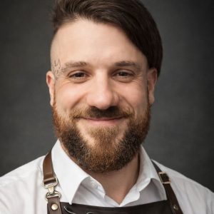 Matt Matt, a barber at Skins & Needles barbers.